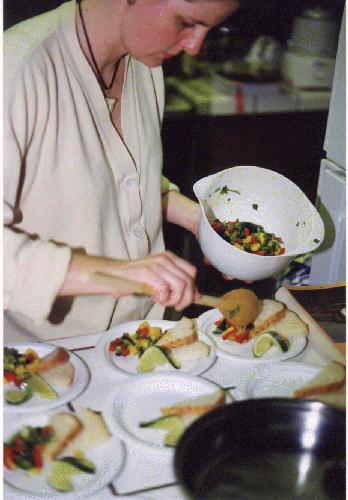 Alison serving the mango salsa