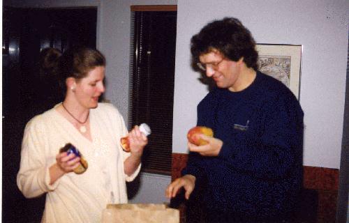 Alison and Marc examine the mangoes