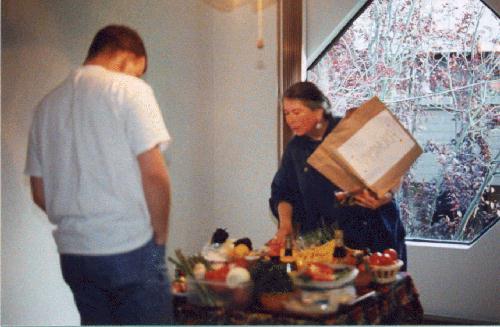 Lori and Ian looking at the ingredients table