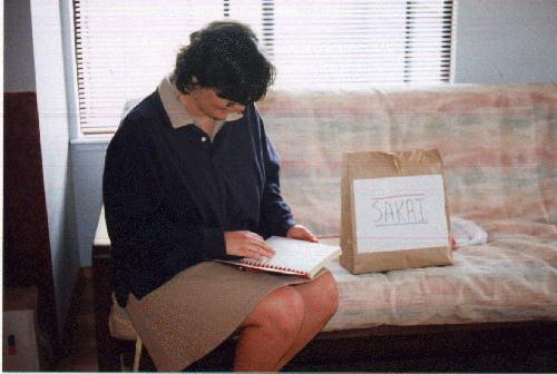 Joanne looking at a cookbook