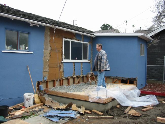 stucco getting removed by Bernie