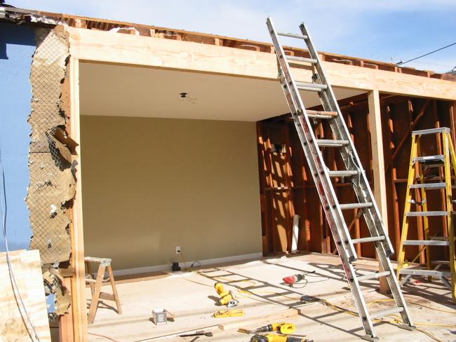 closer view of bedroom with ladder