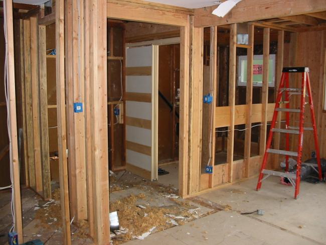 framing of closet and bathroom showing pocket door