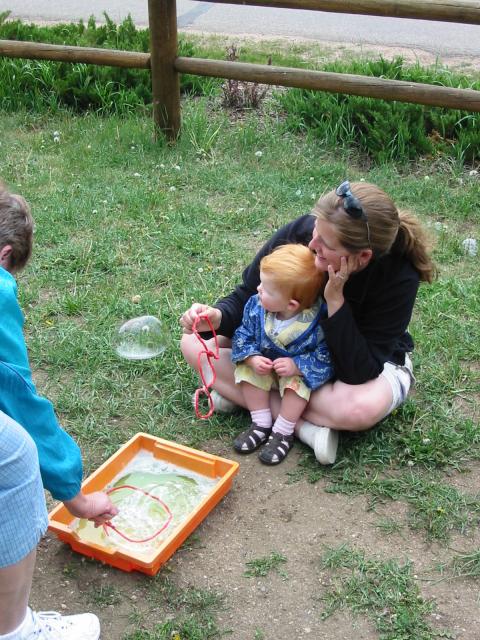 Cielo and Alison watch a big bubble go by