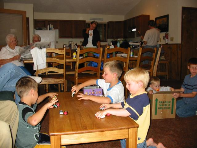 Boys playing with cars